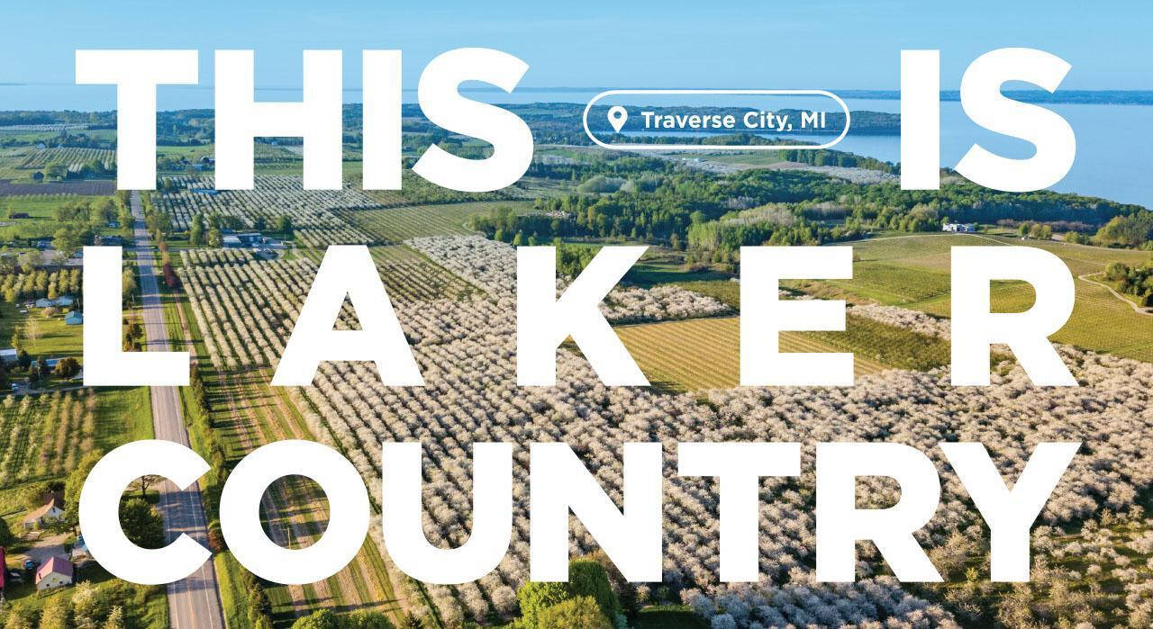 THIS IS LAKER COUNTRY written over a picture of traverse city's vineyards